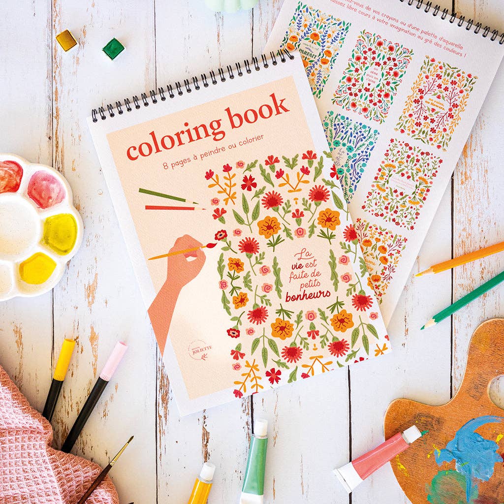 Illustration fleurie du carnet Petits bonheurs partiellement coloriée avec des crayons de couleur.