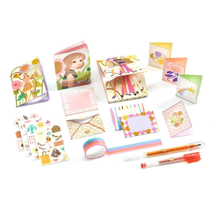 Carnets, cartes et accessoires créatifs contenus dans la boîte Tinou