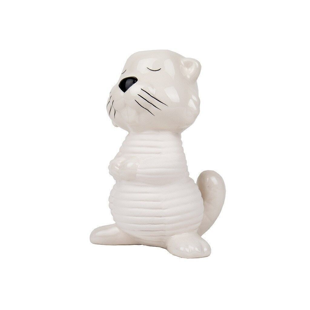 Castor en céramique recouvert de pousses de chia vertes