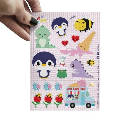Planche de stickers pingouin kawaii avec camion de glace et motifs colorés
