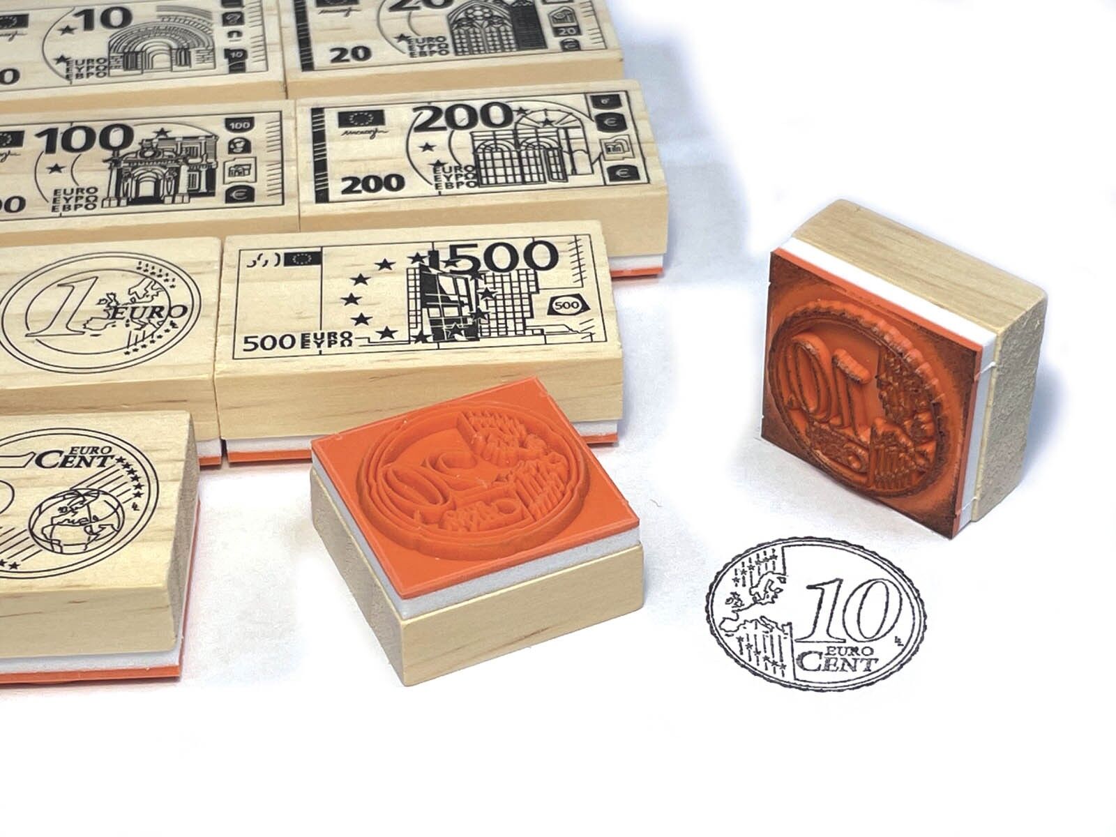 Détail des tampons Crealign Euro montrant les billets et pièces à tamponner.