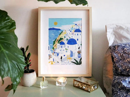 Affiche Santorini peinte, maisons blanches et toits bleus inspirés des Cyclades.