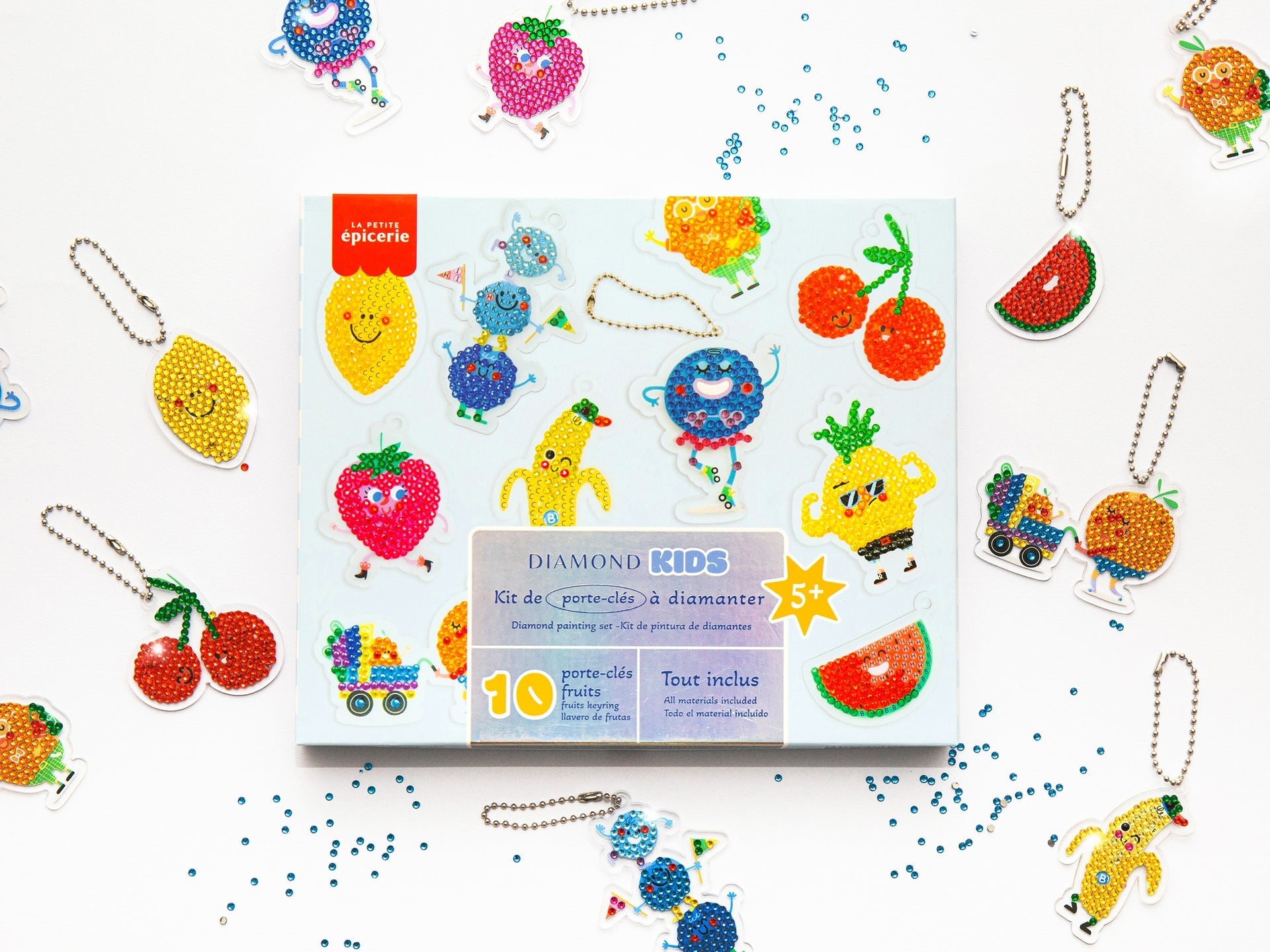 10 porte-clés fruits à décorer, modèles colorés avant pose des strass.