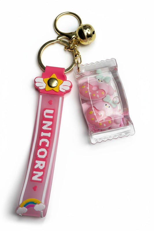 Porte-clés kawaii sachet bonbon avec donut flottant dans liquide magique. Accessoire mignon et original.