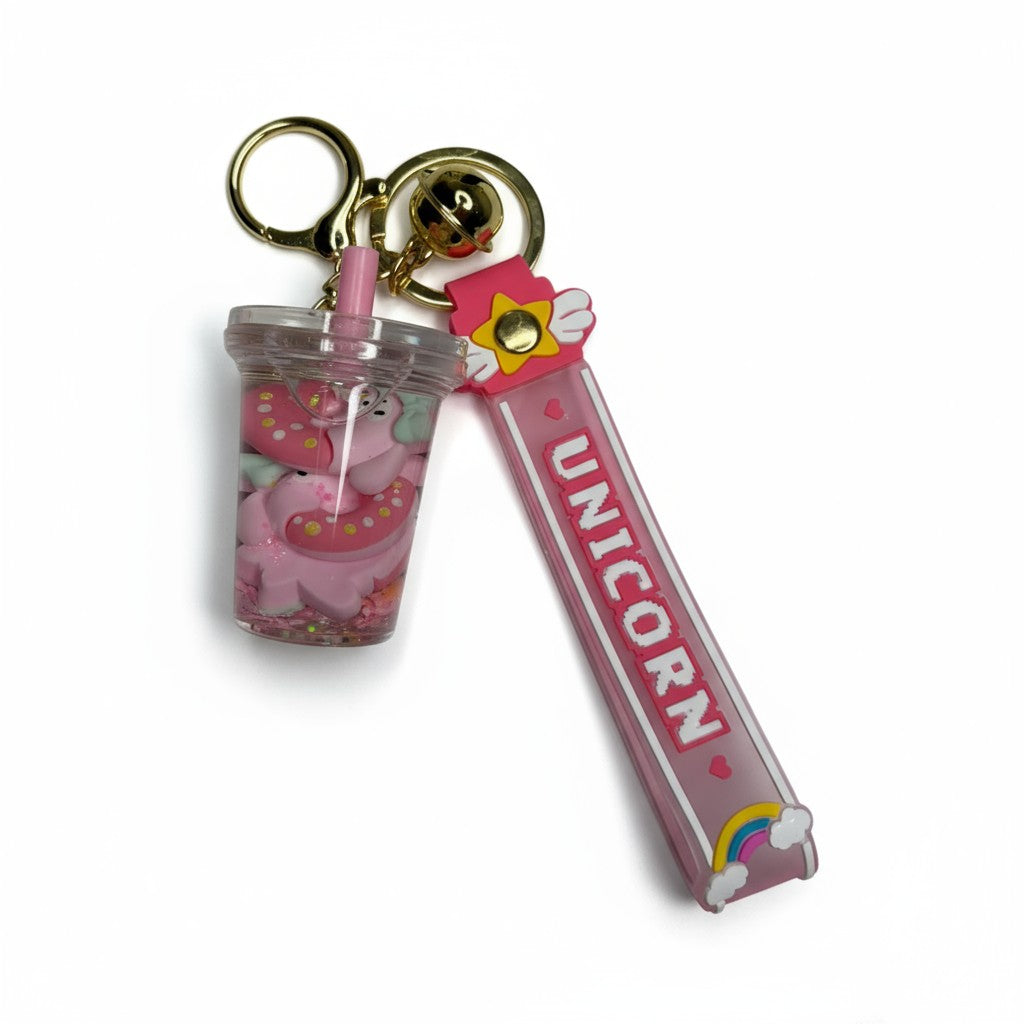 Porte-clés donut rose flottant dans liquide magique transparent. Design kawaii gourmand.
